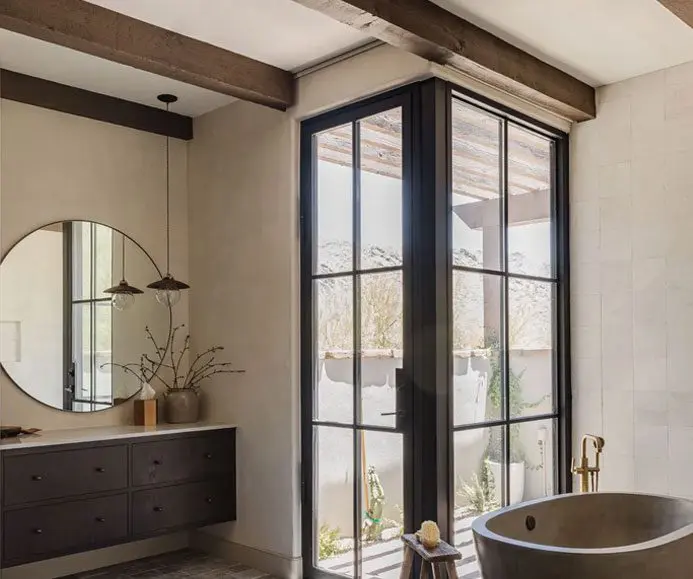 A bathroom with a tub and sink in it