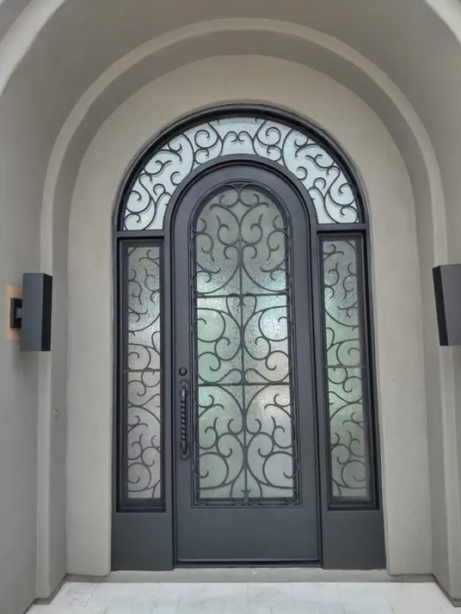 A door with a wrought iron design on it.