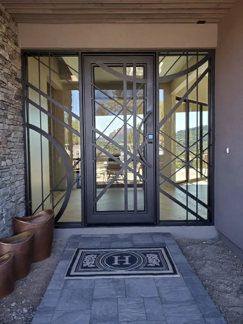 A door with glass and metal panels in it